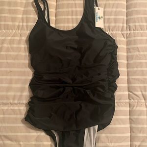 NWT ladies ruched black one-piece swimsuit. Large